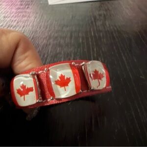 Red Bracelet with Canadian Flag Design